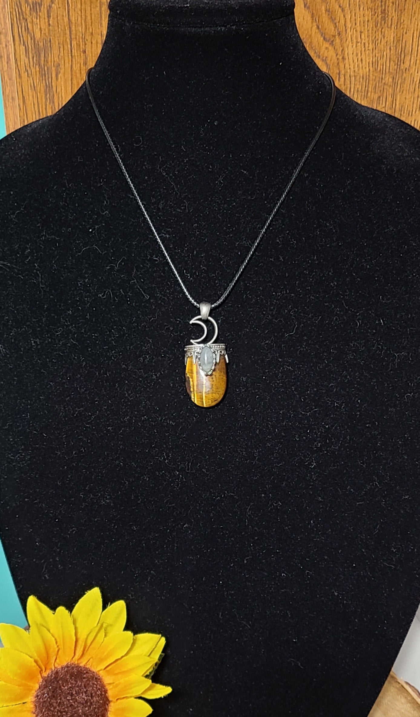 Rainbow Moonstone and Carved Tiger Eye Moon Pendant