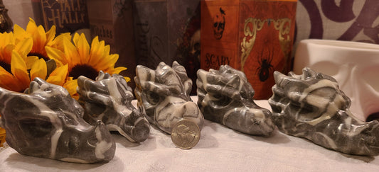 1,000 Eye / Shell Jasper Carved Dragon Heads