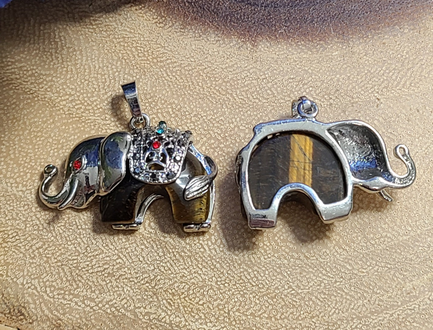 Carved Gemstone Elephant Pendant Necklaces With Silver and Jeweled Adornments